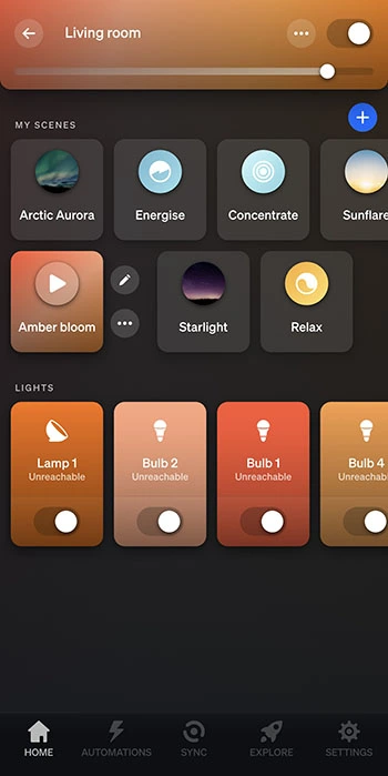 Screenshot of the Philips Hue app home page showing different colour settings for Megan's living room lights